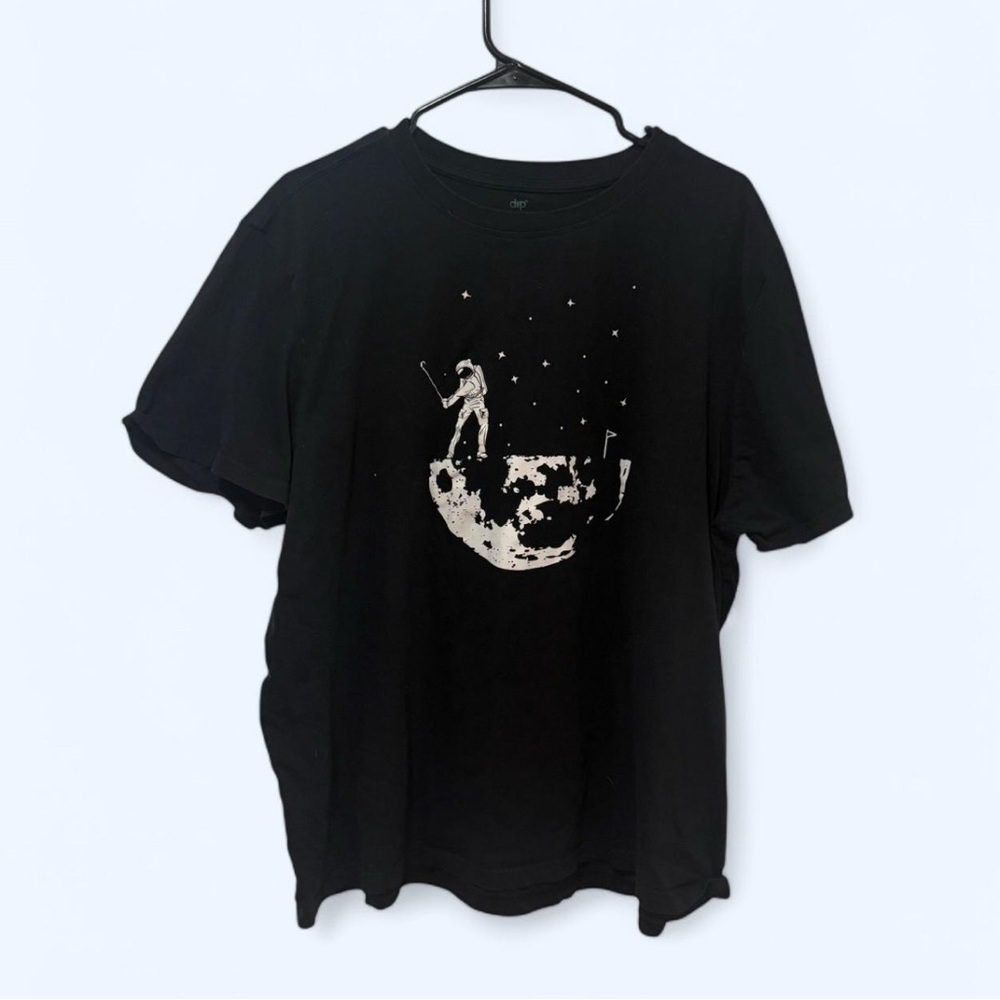 Black and white golf astronaut tee